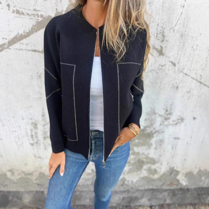 Ladies' knit jacket with stylish zipper details and a fine textured pattern Lune London