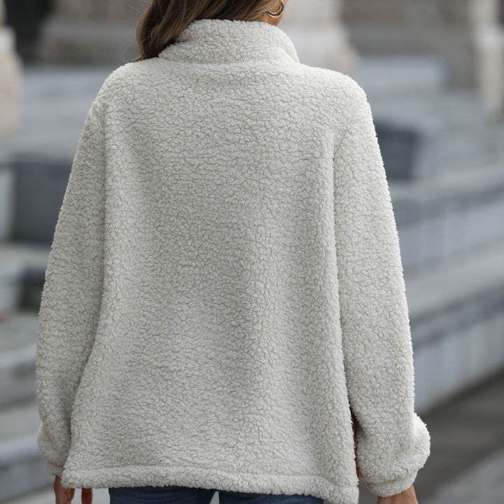 Women's fleece jacket with modern patchwork details and a chic animal print