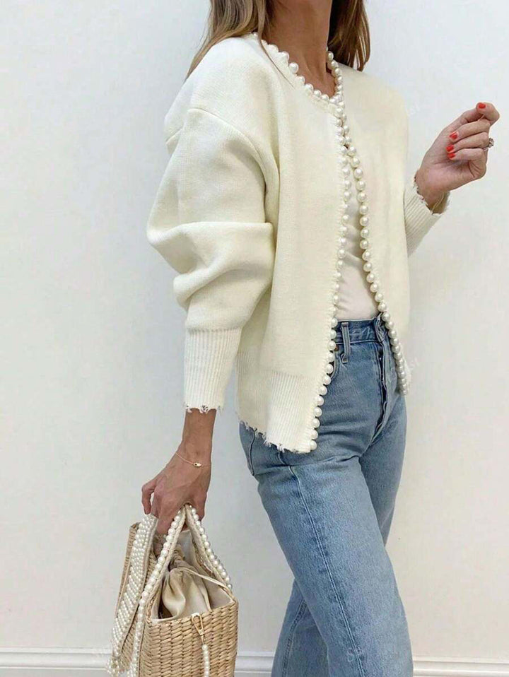 Lady cardigan with pearl decoration and chic stylish cut