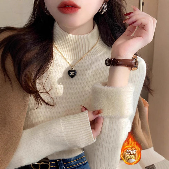 Pull femme avec col roulé et ourlet moelleux luxueux Chic & Stil