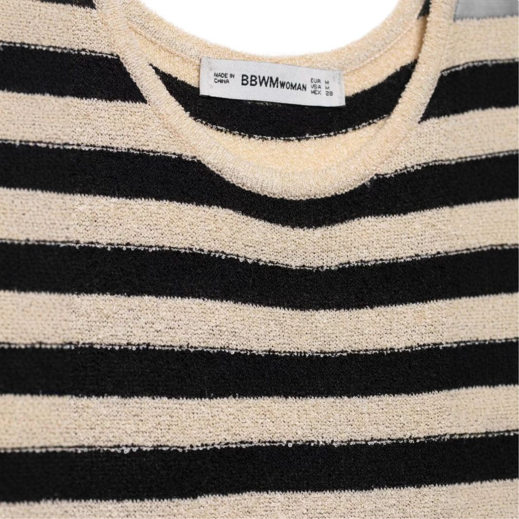 Maxi dress for women with an asymmetrical stripe pattern and elegant ruffle trim Lune London