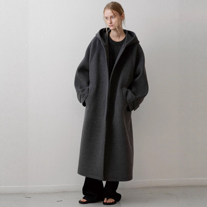 Manteau surdimensionné élégant pour femmes avec capuche et poches pratiques Chic & Stil