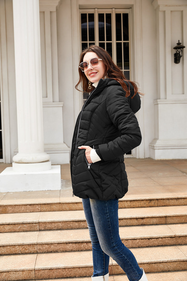 Women's quilted winter coat with soft lining and convenient zipper Lune London