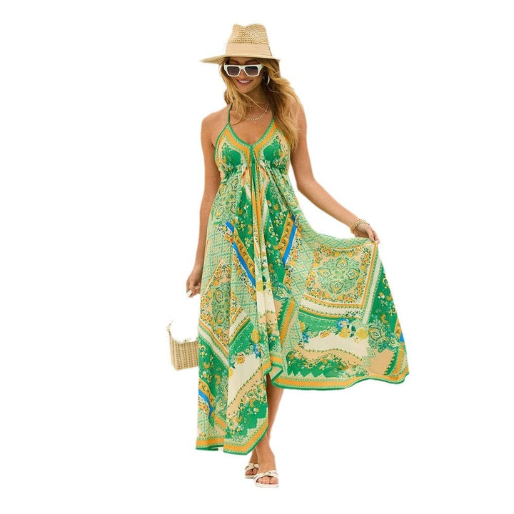Boho-inspired maxi dress for women with an elegant V-neck and an asymmetrical hem Chic & Stil