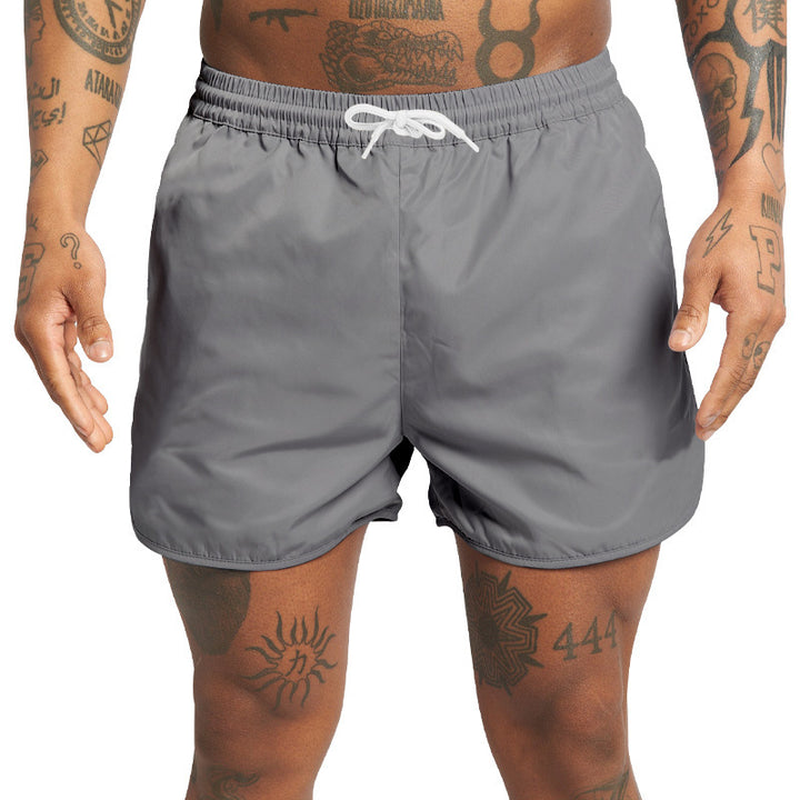 Shorts de bain pour hommes avec taille élastique et poches latérales pratiques Lune London