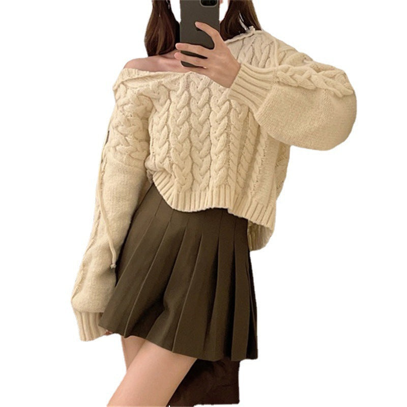 Poncho en tricot épais pour femmes avec capuche et design contemporain Chic & Stil