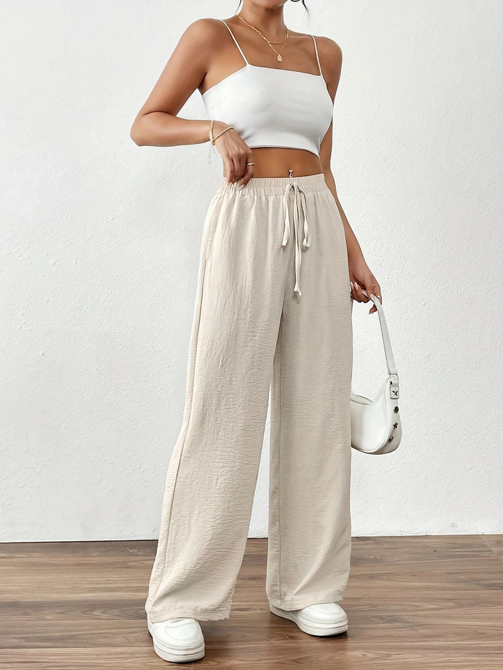 Loose linen pants for women with elastic waist and side pockets Lune London