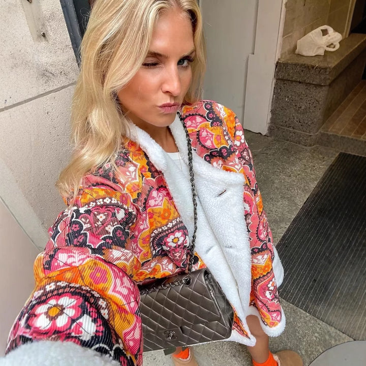 Quilted women's jacket with floral fleece lining and stylish button closure Lune London
