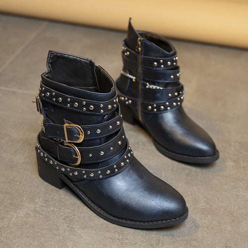 Trendy women's ankle boots with decorative straps and chain elements Lune London