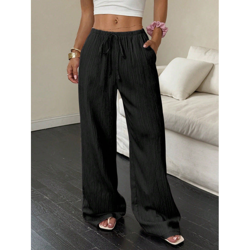 Casual and wide trousers for women with elastic waist and tie belt Lune London