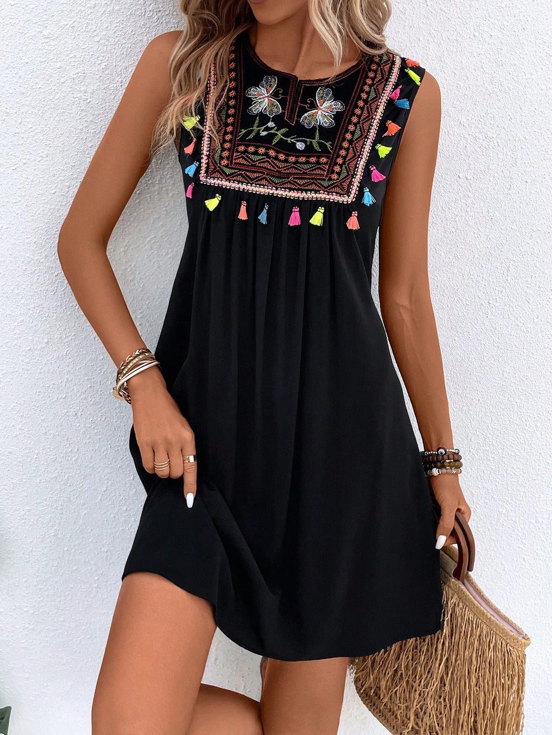 Lightweight summer dress for women with embroidered colorful detail Lune London