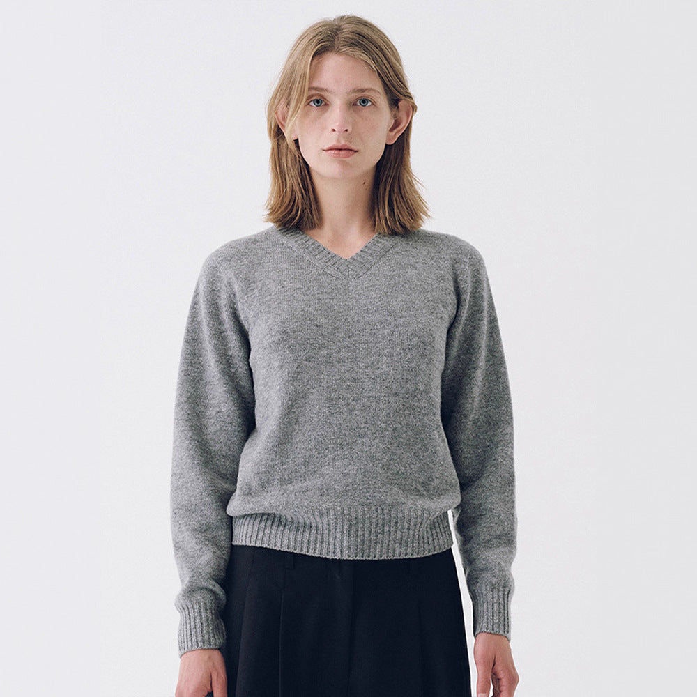 Pull fin en maille pour femmes avec col en V et large poignet Chic & Stil