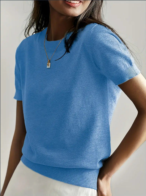 Fine knit sweater for women with a short sleeve silhouette and a soft fluid material Elegance and style