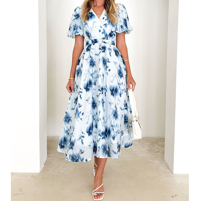 Midi dress for women with a playful wrap design and floral accents Chic & Stil