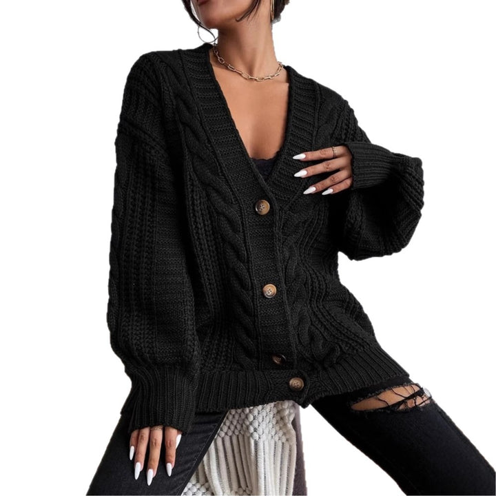 Thick knitted jacket for women with characteristic twisted design Lune London