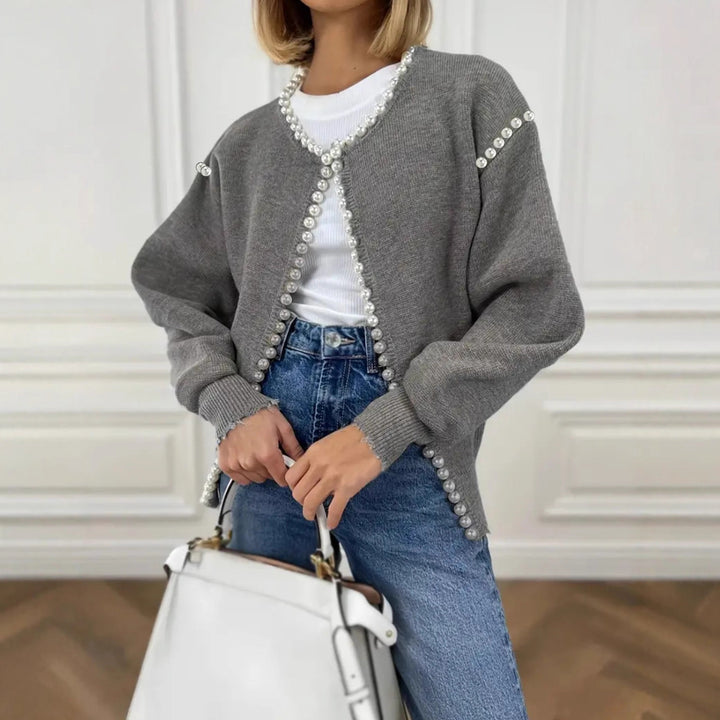 Women's knit jacket with striking bead embellishments and an open design Lune London