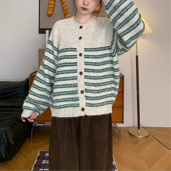 Ladies Chunky Knit Jacket with Modern Stripes and Chic Button Details and Style