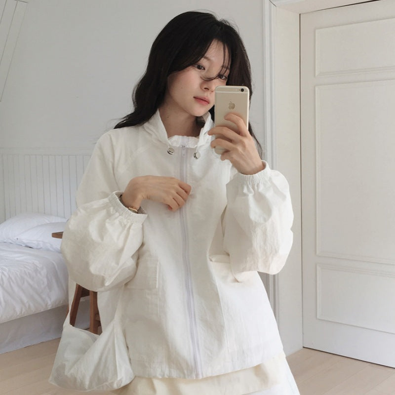 Women's sporty transitional jacket with high collar and practical pockets Chic & Stil