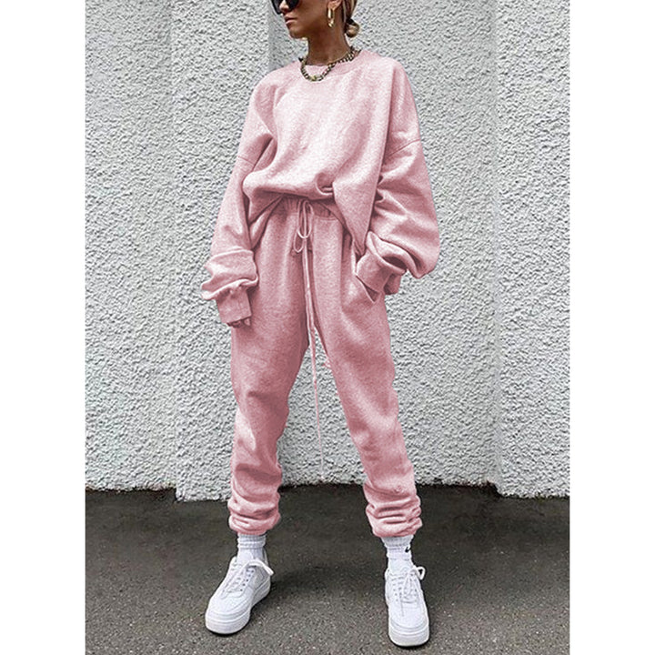 Women casual and comfortable leisure set with an oversized sweater and chic jogging pants and style