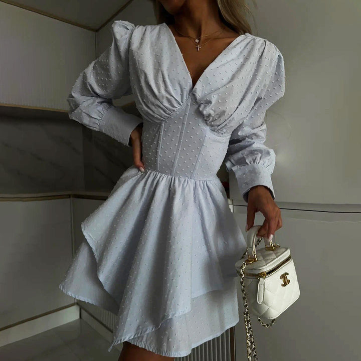 Playful wrap dress for women with voluminous sleeves and an asymmetrical hem Lune London
