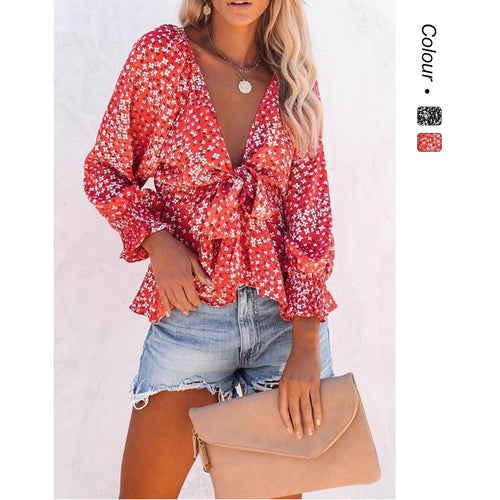 Ladies blouse top with playful floral pattern and elegant knot detail Lune London