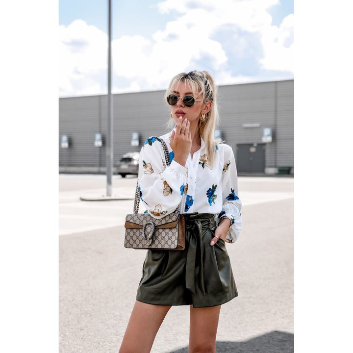 Blouse pour femmes avec motif floral et manches ballon Chic & Stil