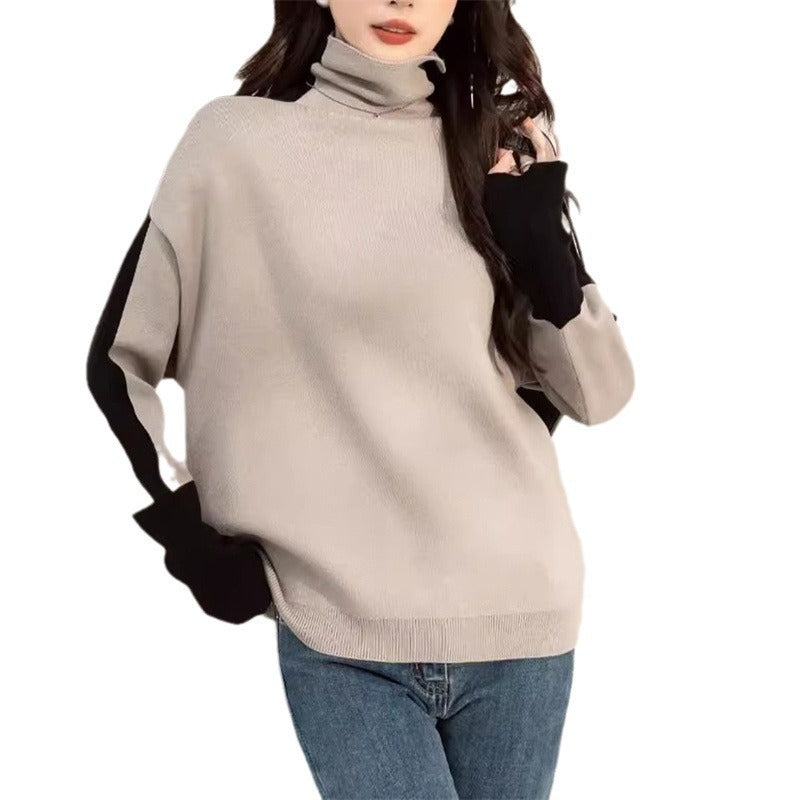 Sweatshirt oversized pour femmes avec col montant moderne et accents de manches contrastants Chic & Stil