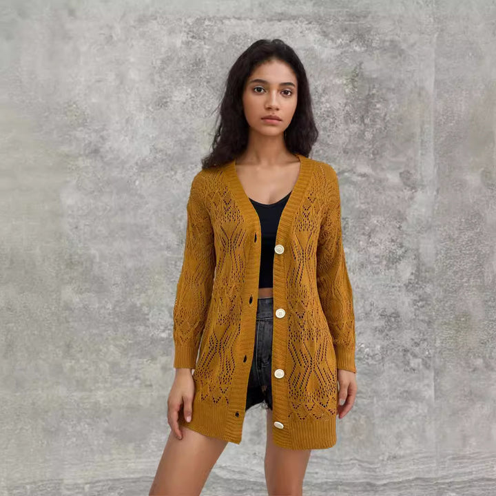 Knitted jacket for women with an artistic hole pattern and practical button details Lune London
