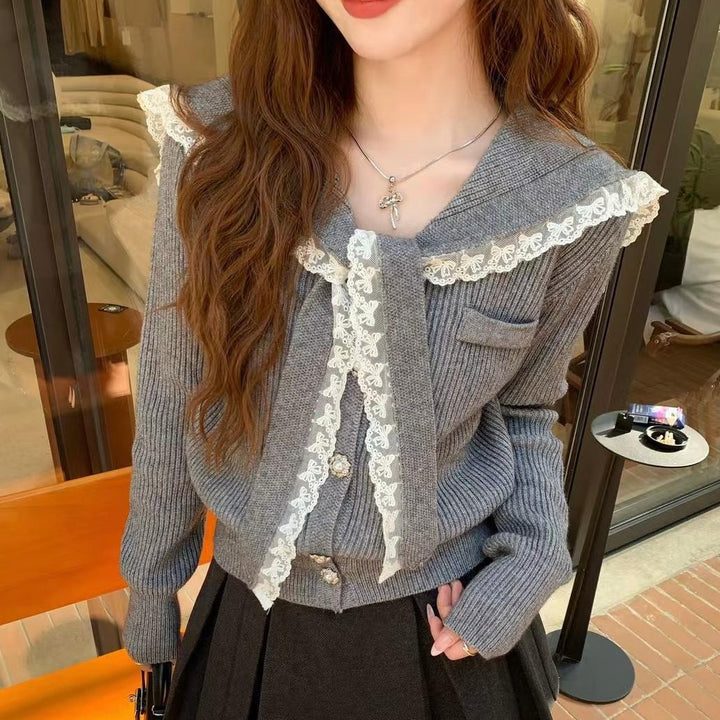 Knitted jacket for women with ruffled collar and decorative buttons Lune London