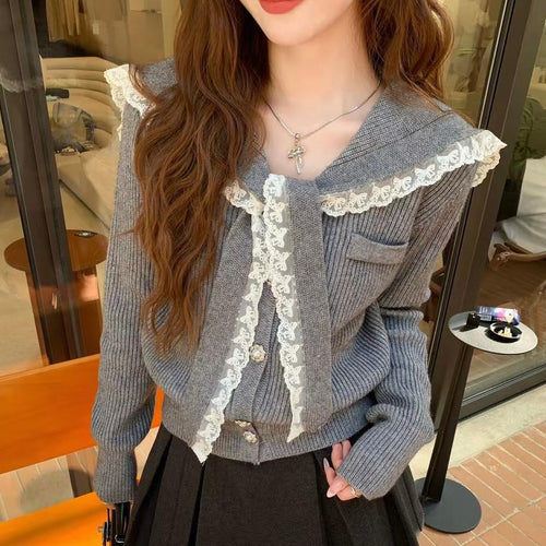 Knitted jacket for women with ruffled collar and decorative buttons Lune London