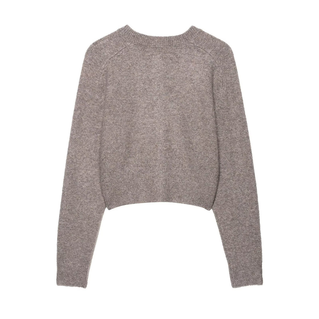 Short knitted jacket for women with fine buttons and an elegant cut Lune London