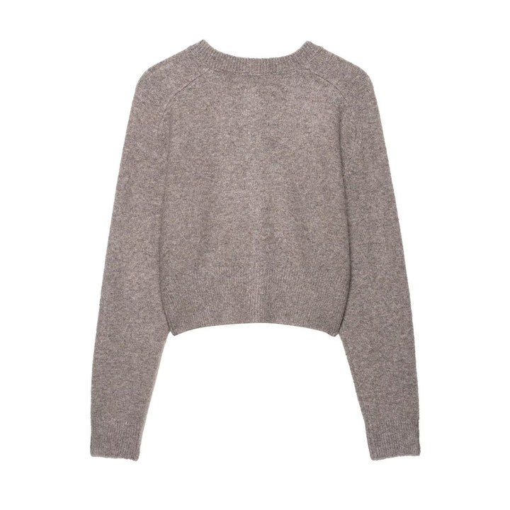 Short knitted jacket for women with fine buttons and an elegant cut Lune London