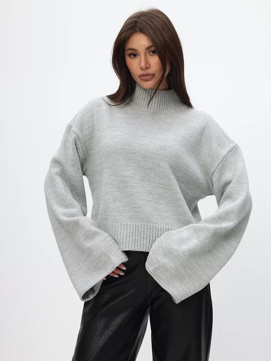 Trendy oversized knit sweater for women with wide sleeves and a high collar Lune London
