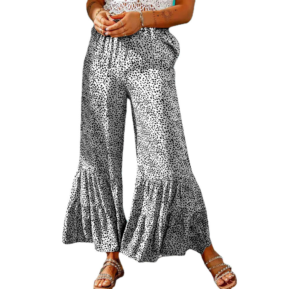 Wide leg palazzo pants for women with a voluminous hem and elastic waistband Lune London