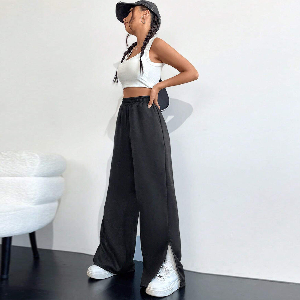 Pantalons satinés larges pour femmes avec taille élastique et fentes latérales Chic & Stil