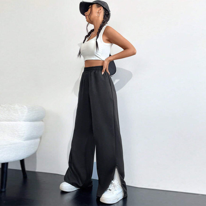 Pantalons satinés larges pour femmes avec taille élastique et fentes latérales Chic & Stil