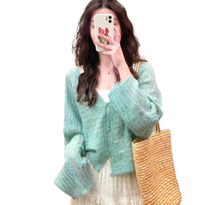 Lightweight knit cardigan for women with a fine openwork knit structure and a loose fit Lune London