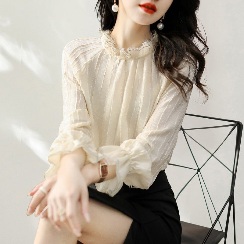 Ruffled high neck blouse for women with sheer sleeve details Lune London