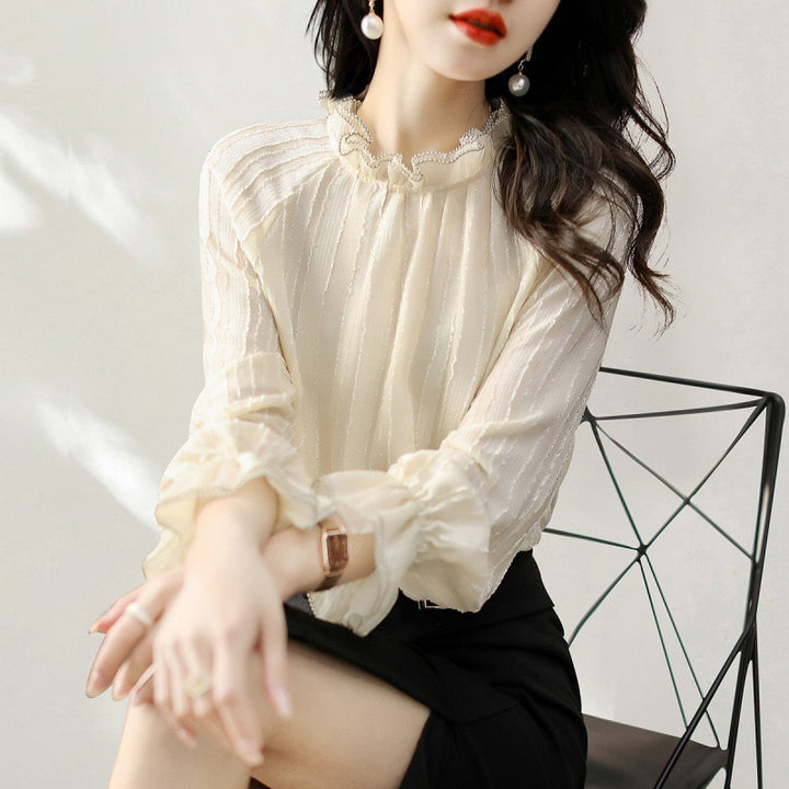 Ruffled high neck blouse for women with sheer sleeve details Lune London