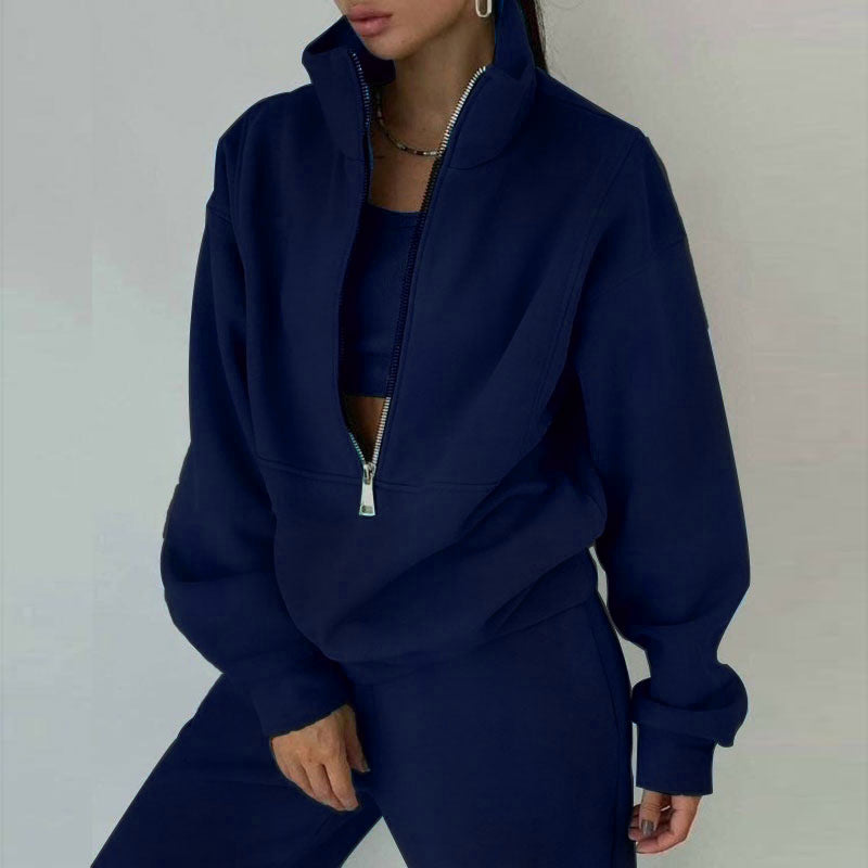 Women's sporty sweatshirt with high collar and practical zipper Chic & Stil