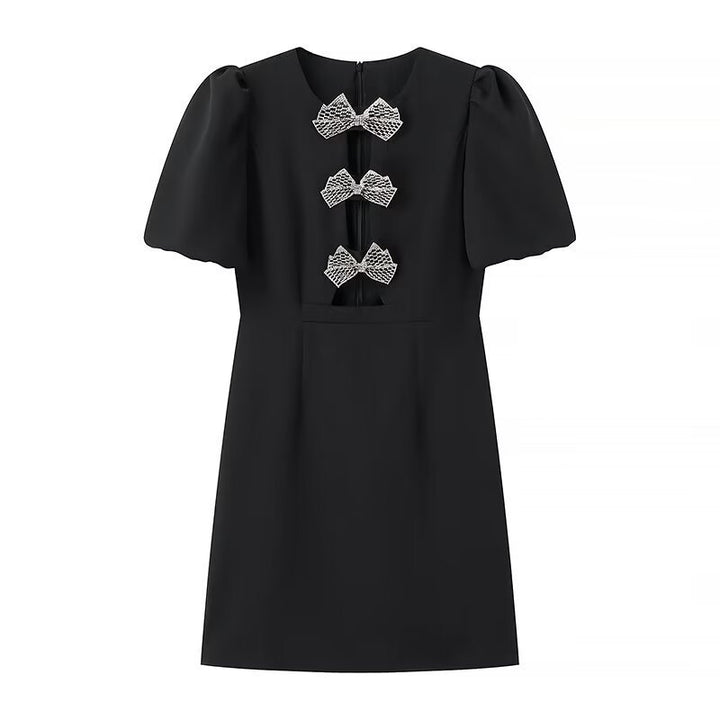 Robe de soirée élégante pour femmes avec manches bouffantes et nœuds décoratifs Chic & Stil