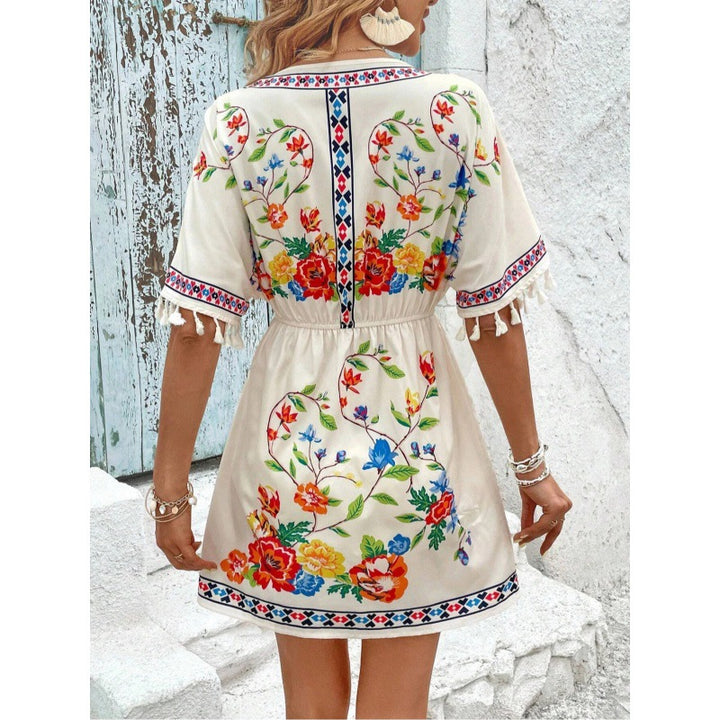 Casual women's dress with a floral design and fringe sleeves Lune London