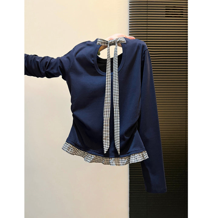 Women's long sleeve shirt with asymmetrical ruffle edge and decorative back Chic & Stil