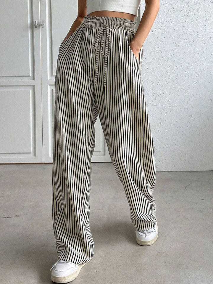 Wide striped pants for women with elastic waist and practical pockets Lune London