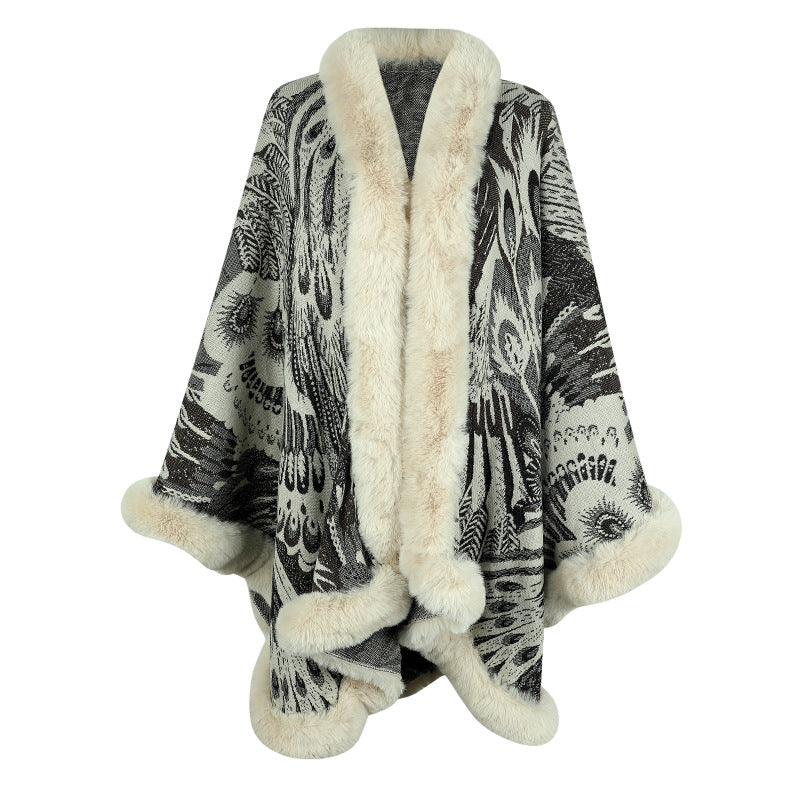 Lune London | Women's luxurious poncho with decorative fleece heat protection