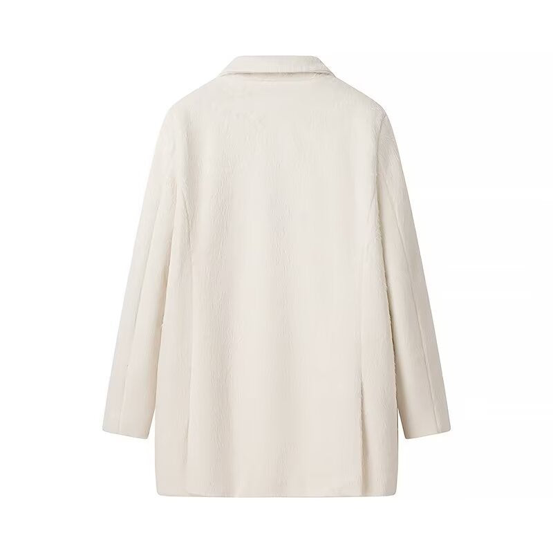 Veste en peluche élégante pour femmes avec coupe classique et poches pratiques Chic & Stil
