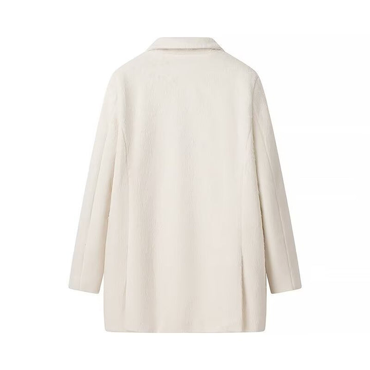 Veste en peluche élégante pour femmes avec coupe classique et poches pratiques Chic & Stil