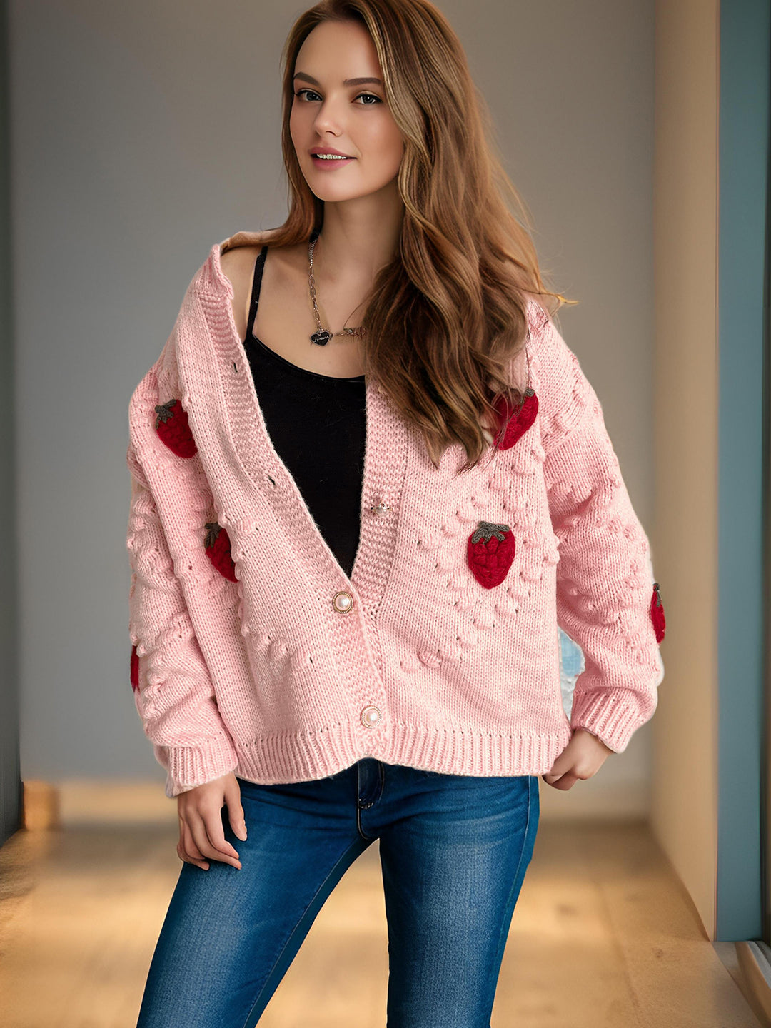 Knit jacket for women with a playful strawberry pattern and Lune London button details