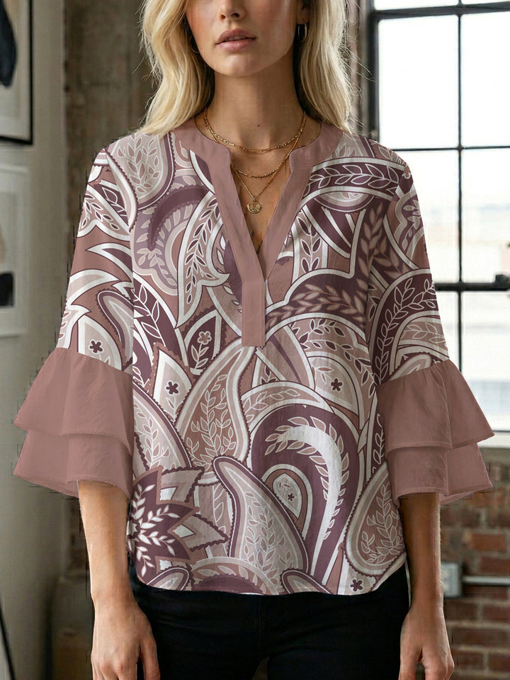 Women's blouse with voluminous ruffle sleeves and creative floral design Lune London