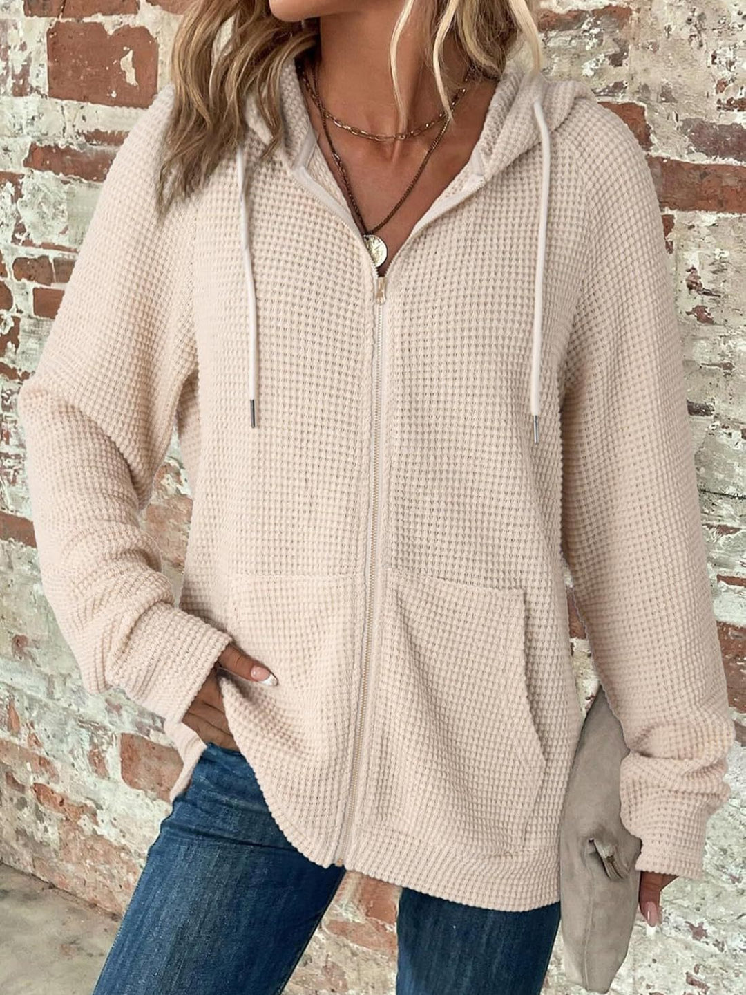 Casual hoodie for women with structured embossed pattern and practical pockets Lune London